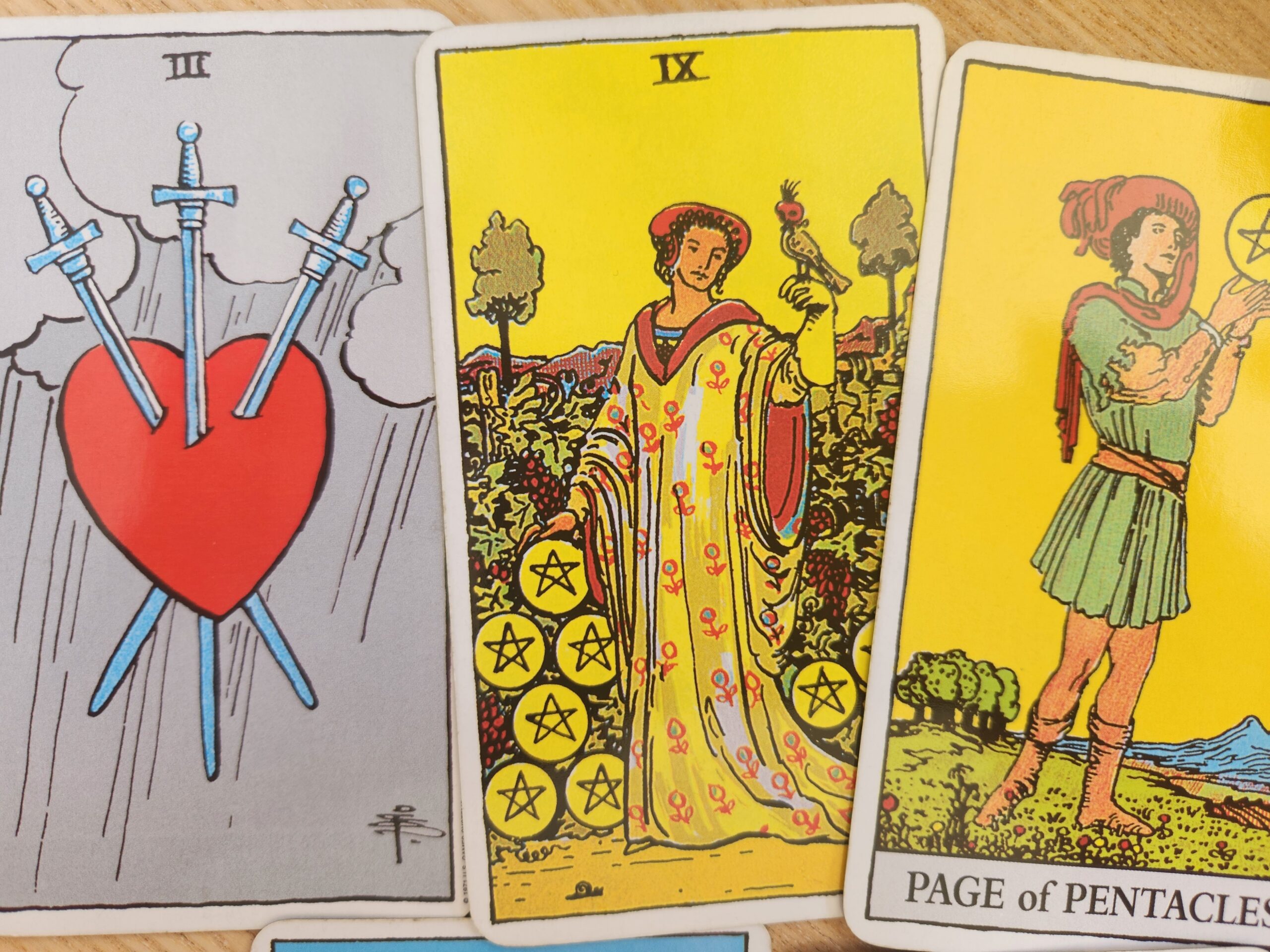 Tarot spread for Weekly Pulse forecast 2 March 2026 featuring 3 of Swords, 9 of Pentacles, Page of Pentacles, 9 of Wands and The Hierophant.